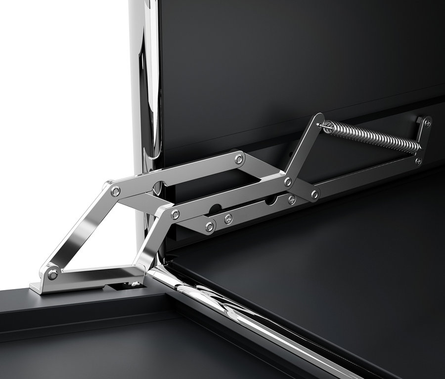 Közeli kép egy fekete CN3 fém komód nyitószerkezetéről.