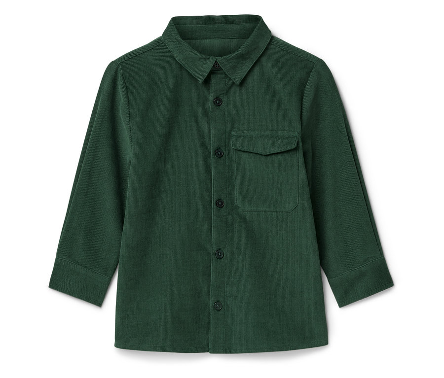 Egy zöld kordbársony ing fekszik fehér háttéren.