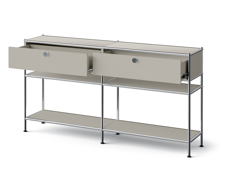 Szürke dohányzóasztal két nyitott fiókkal.