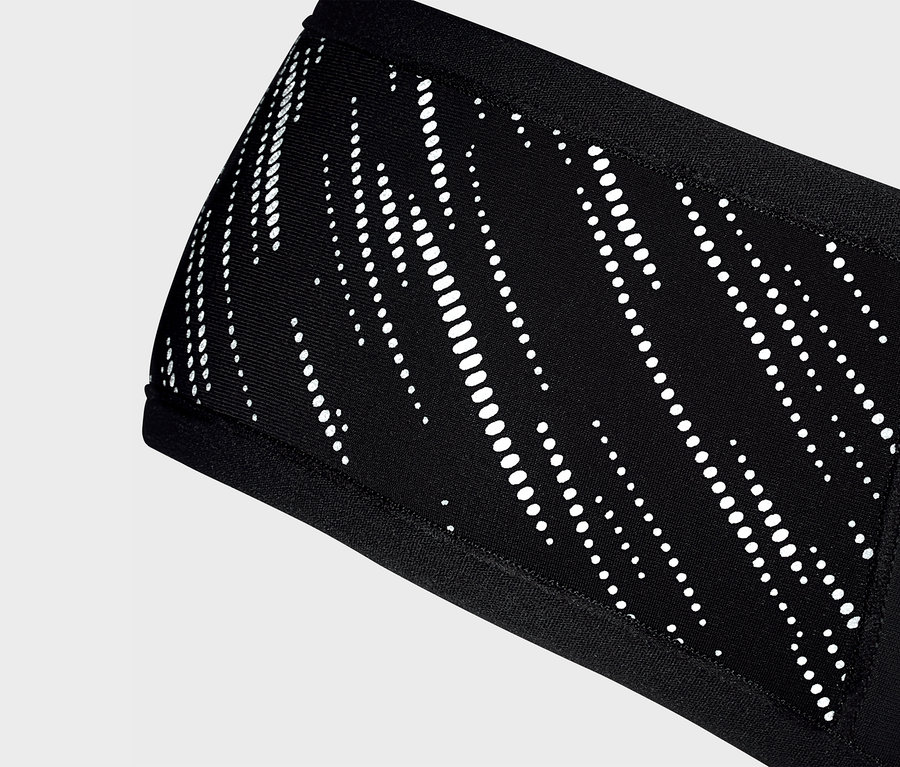 Kép egy fekete Windprotection-Stirnband fejpántról, fehér mintával.