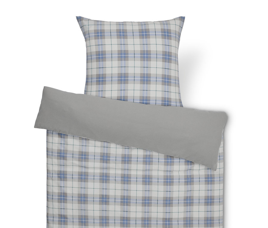 Kockás ágynemű szett szürke párnahuzattal.