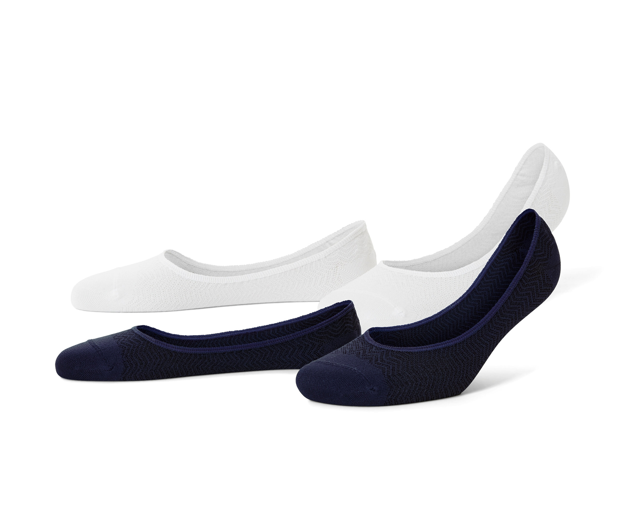 Két pár fehér és két pár sötétkék titokzokni.