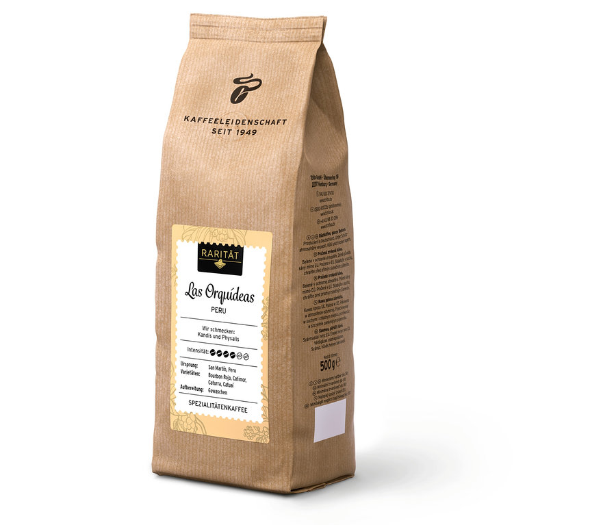 Egy 500 g-os »Las Orquídeas Peru« kávébab csomag áll egy fehér felületen.