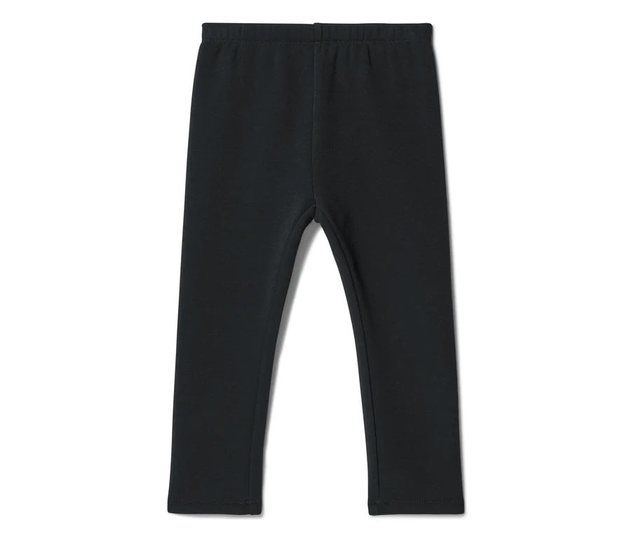 Fekete leggings rugalmas derékrésszel, laposan fektetve.