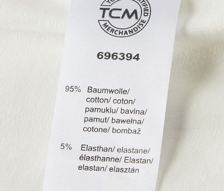 Címke az 5 kisgyerek body állítható hosszúsággal anyagösszetételéről, 95% pamut és 5% elasztán.