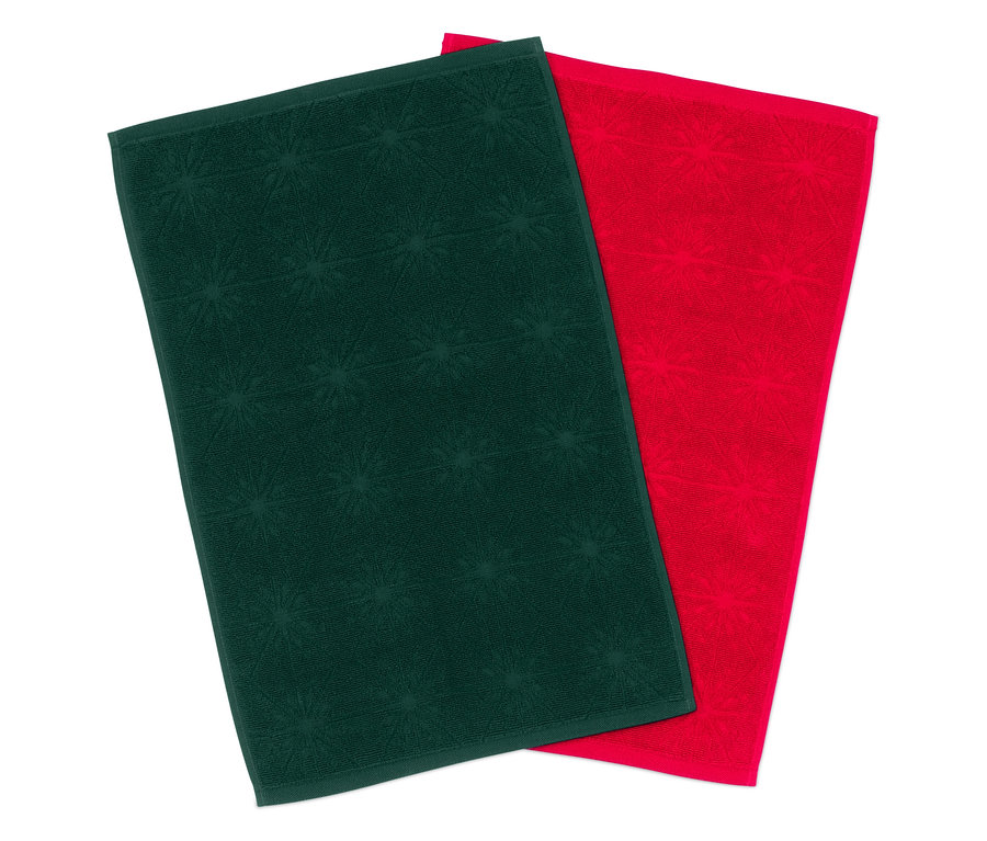 Két törölköző: egy zöld, csillagmintás, a másik piros.