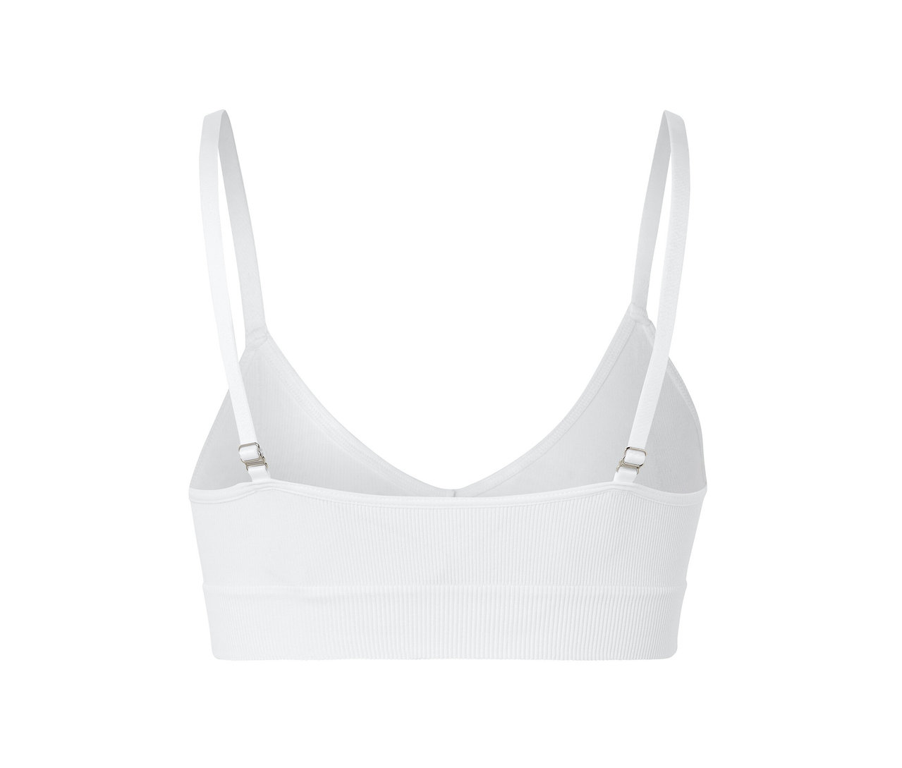 Egy fehér, varrásmentes, bordás szerkezetű bustier melltartó részletfotója.