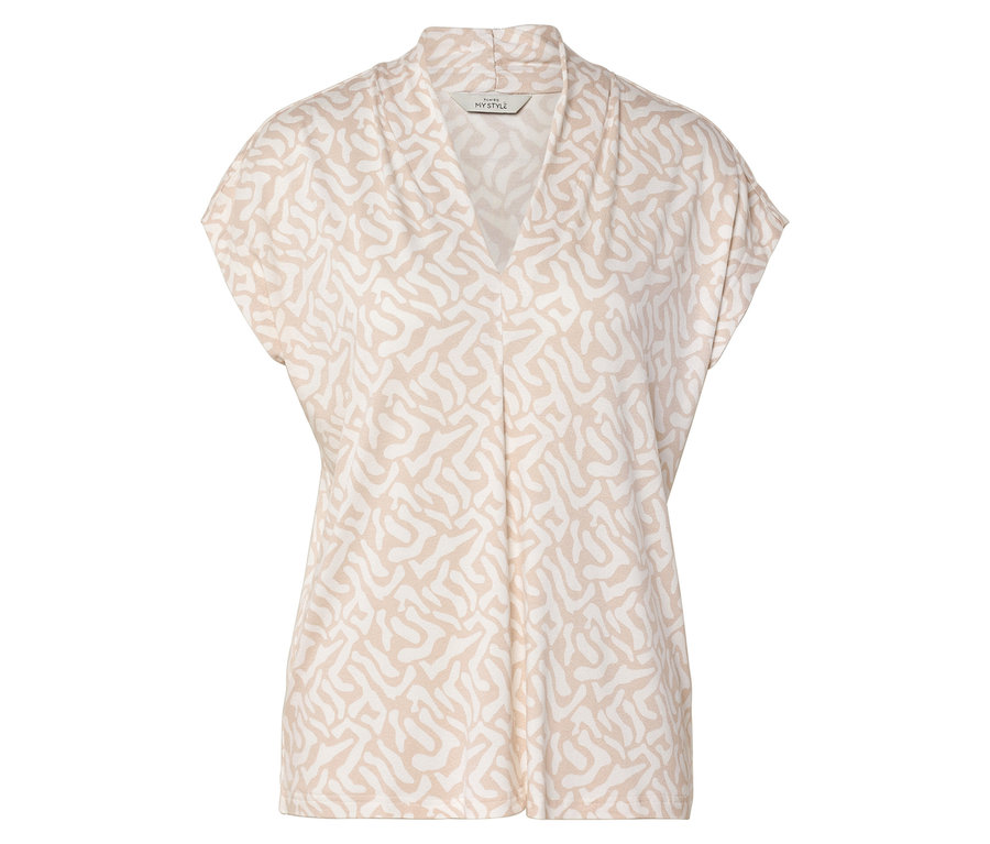 Egy rövid ujjú, bézs-fehér mintás, V-nyakú felső.