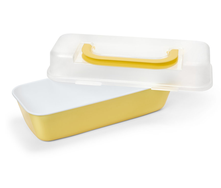 Sárga kenyérdoboz részben nyitott, átlátszó fedéllel és sárga fogantyúval.