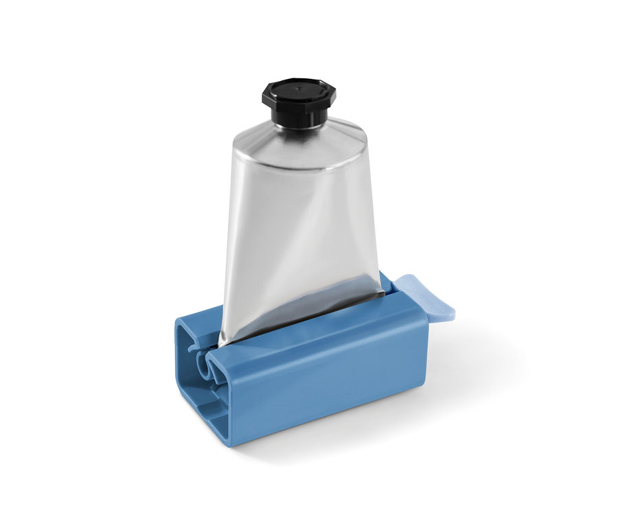 Ezüst tubus kék tubusnyomóban.