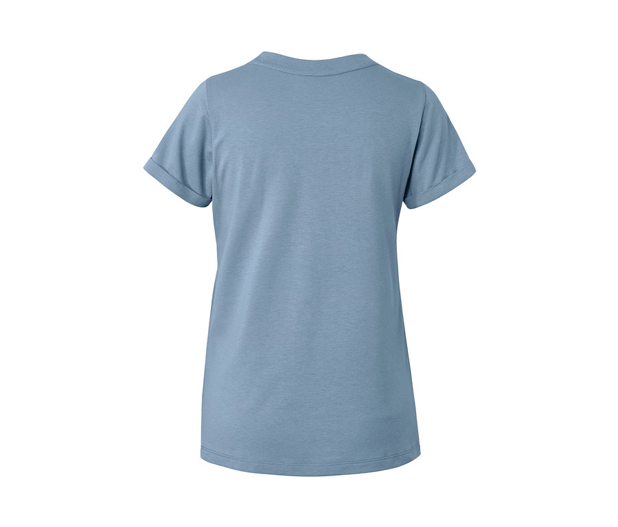 Hátulnézet egy világoskék női funkcionális felsőről.