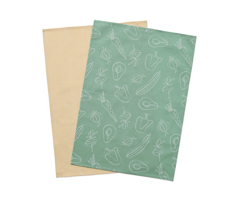 Két konyharuha: egy sárga csíkos, egy zöld zöldségmintával.