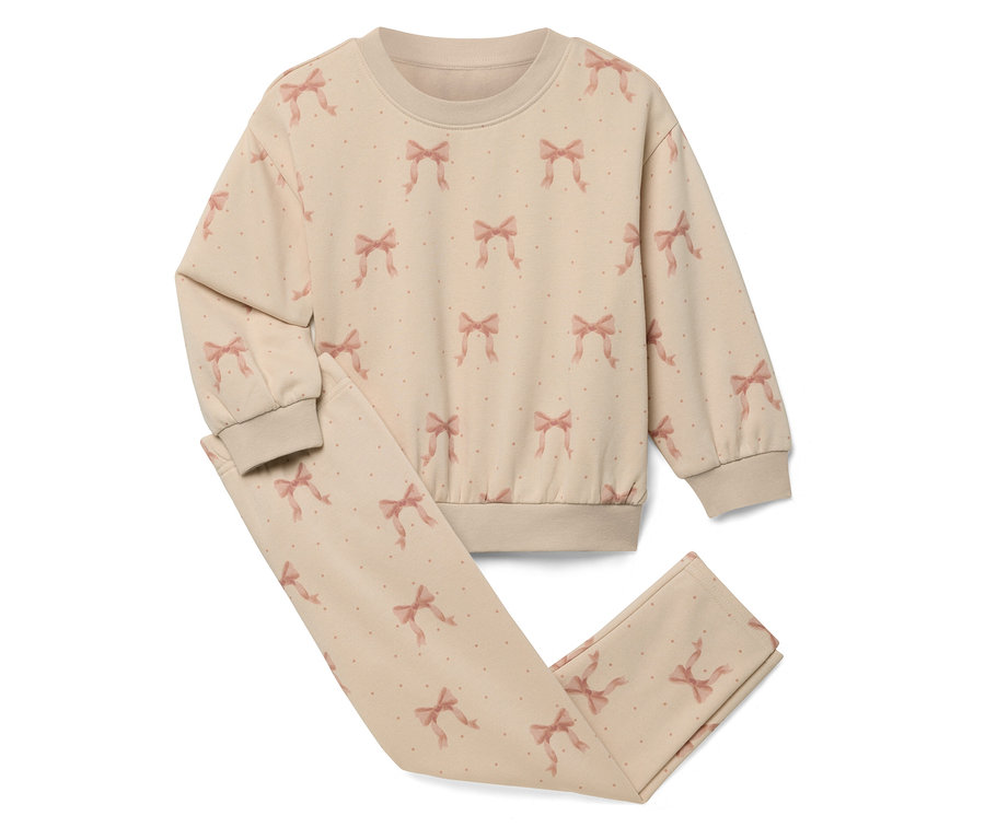 Masnis mintázatú, bézs színű pizsama szett, amely egy felsőből és egy nadrágból áll.