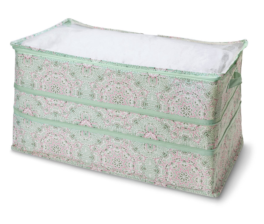 Egy zöld mintás, rózsaszín részletekkel ellátott, fedeles Jumbo-tároló látható.