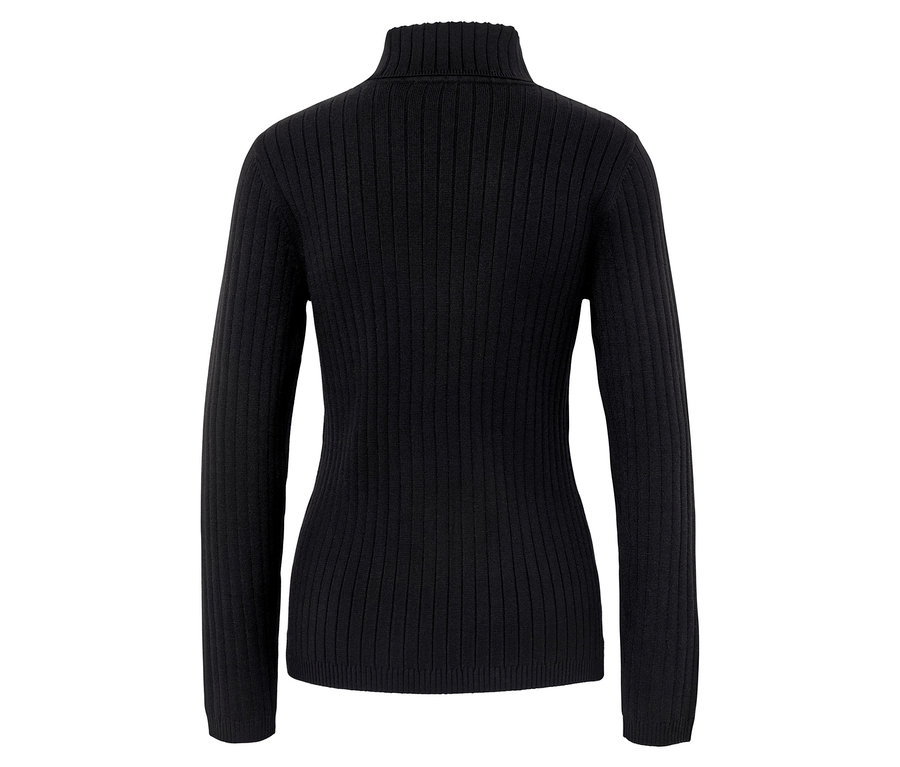 Fekete, bordázott garbó fehér alapon.