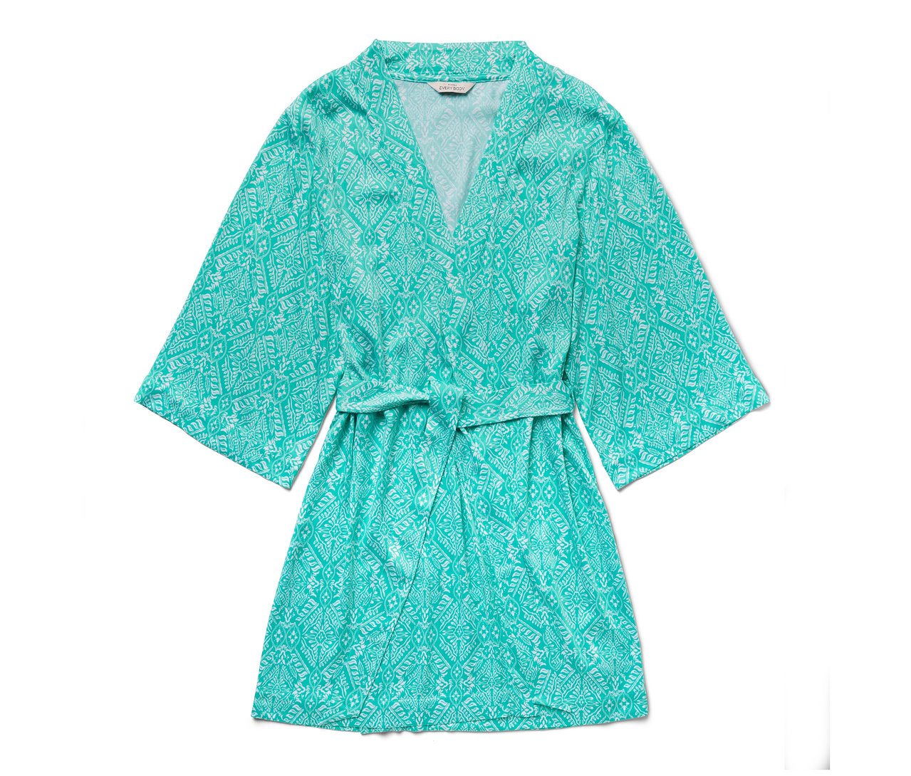 Türkiz köntös fehér mintával.