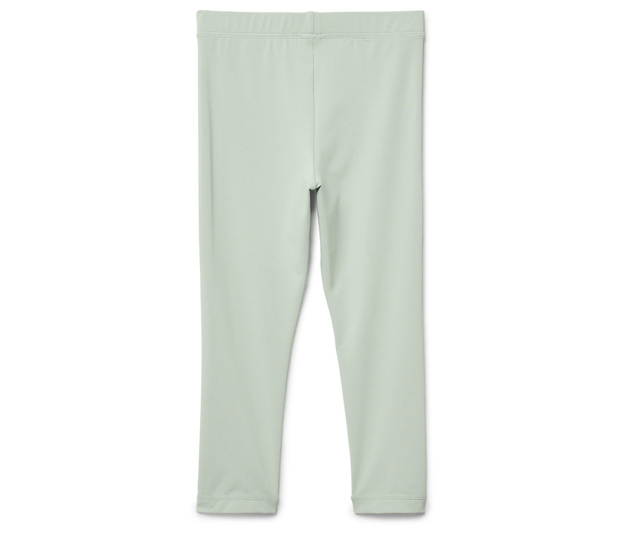 Világoszöld leggings fehér háttérrel.