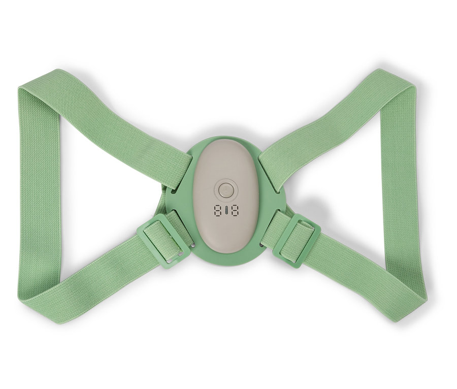 Zöld testtartás-korrektor állítható pántokkal és digitális kijelzővel fehér háttérrel.