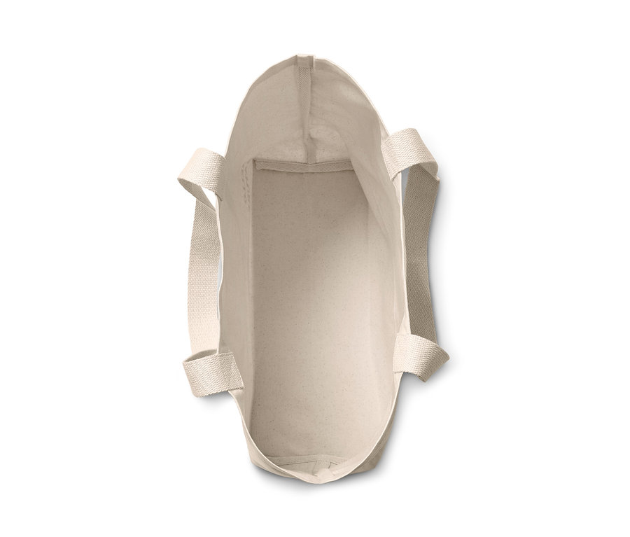 Felülnézet egy üres női vászon bevásárlótáskáról.