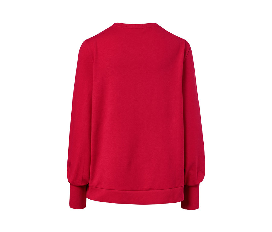 Egy piros női szabadidőfelső hátulnézete.