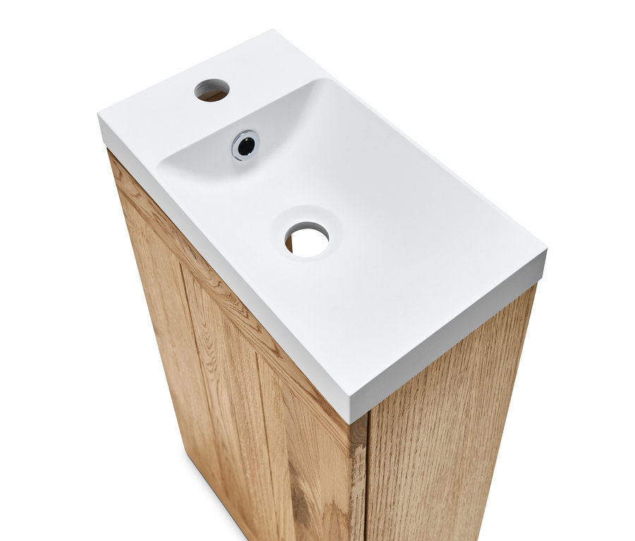 Felülnézet egy fehér, alsószekrényes vendégmosdóról.