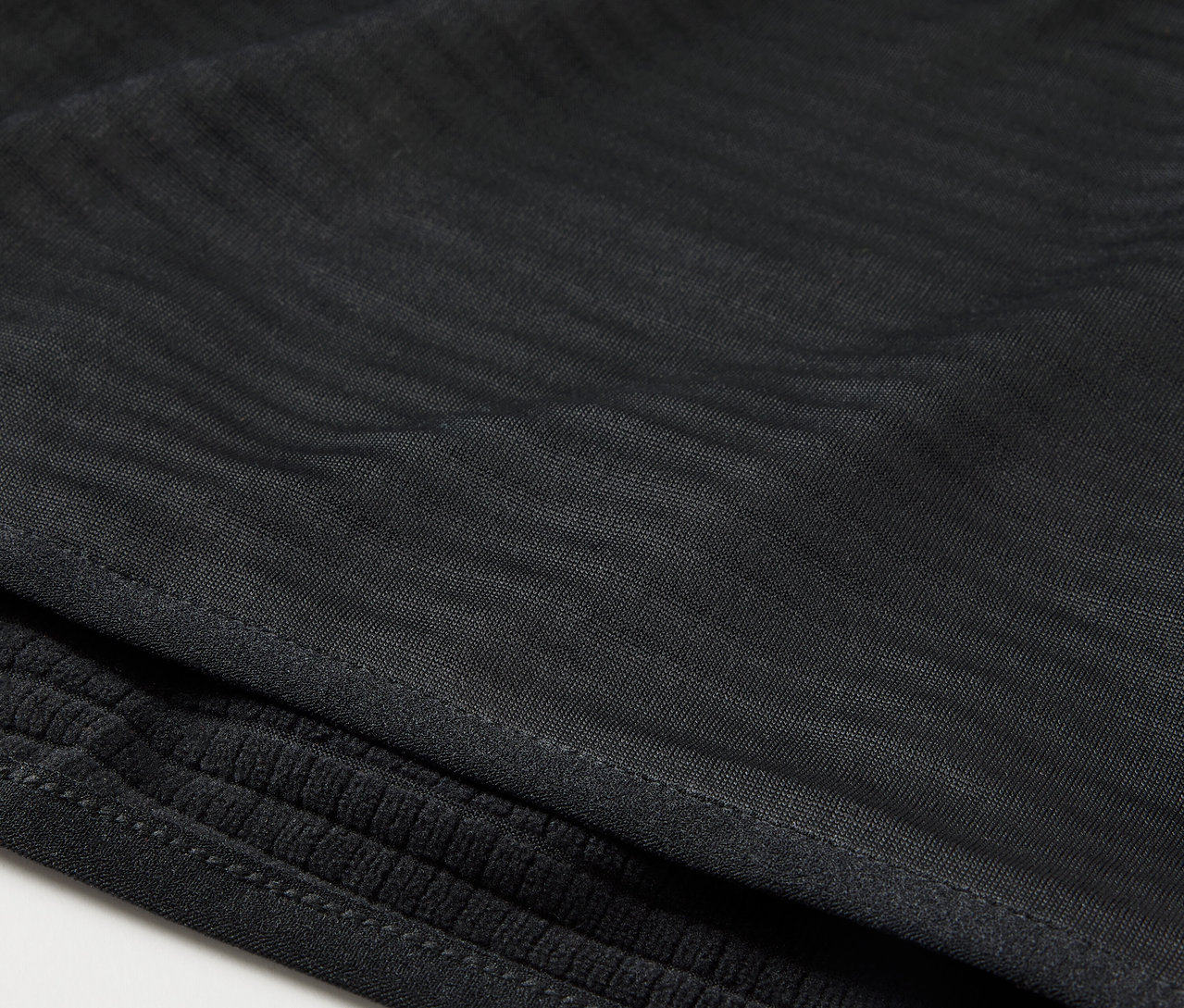 Közelkép egy multifunkciós kendőről.