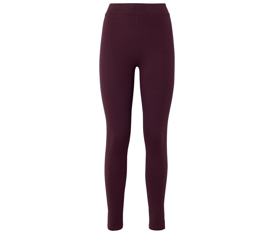 Sötétvörös leggings fekszik fehér háttér előtt.