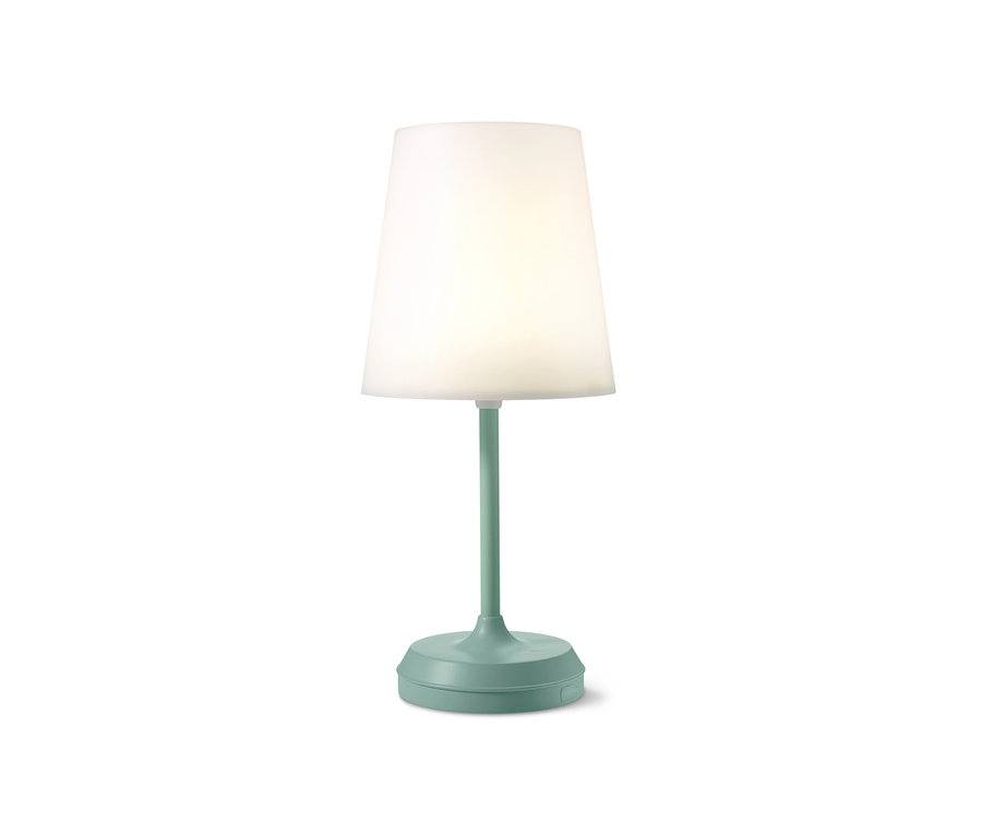 Egy zöld LED-es kültéri asztali lámpa akkumulátorral és lámpabúrával.
