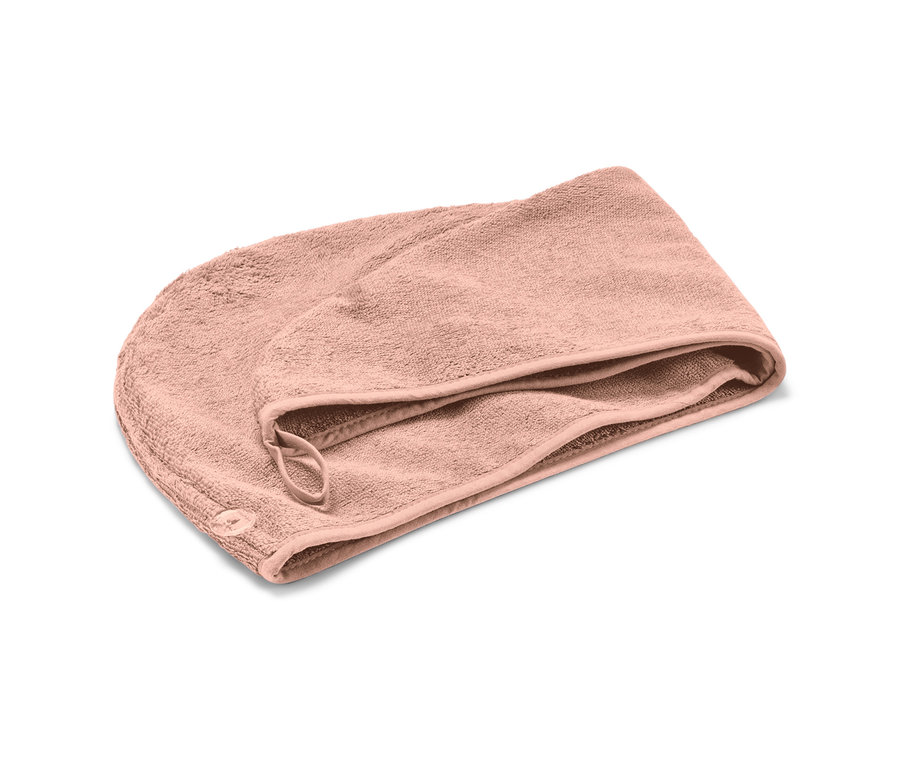 Rózsaszín turbán alakú törölköző.