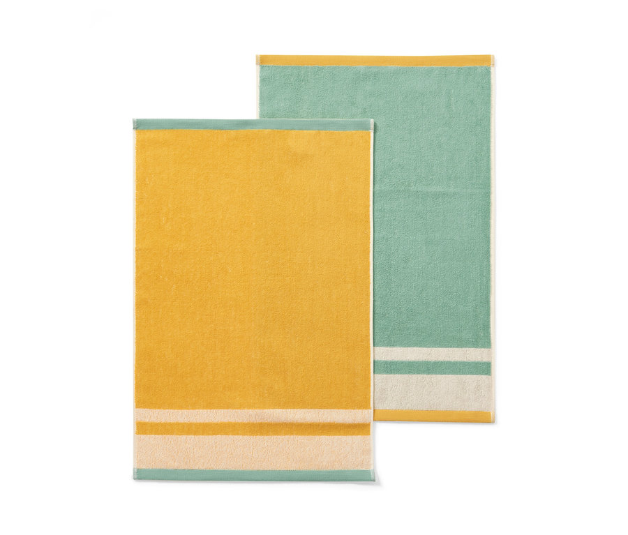 Két konyhai törlő: egy sárga és egy zöld.
