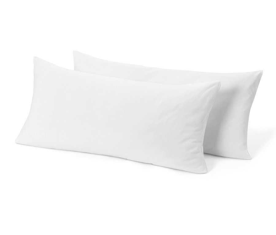 Két törtfehér jersey párnahuzat.