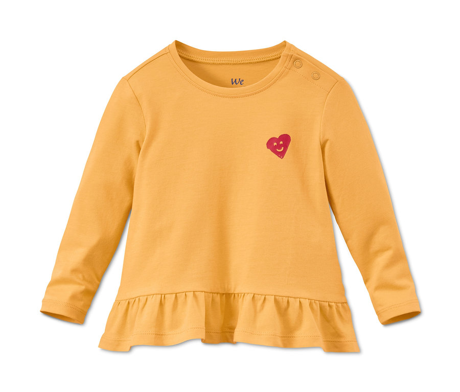 Sárga, hosszú ujjú, fodros szegélyű biopamut póló.