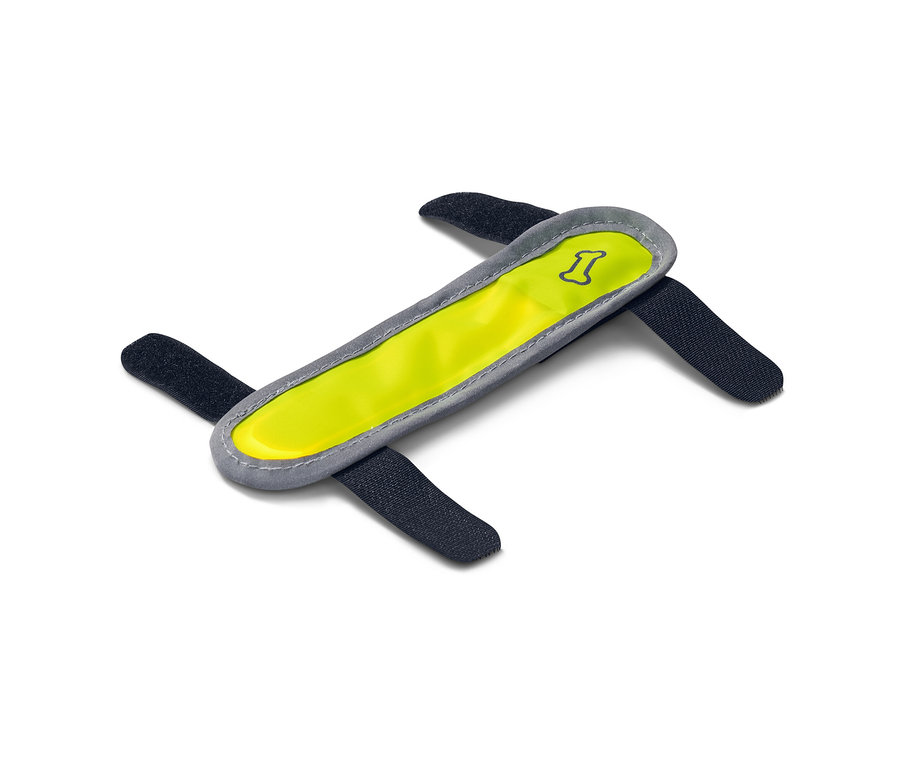 Sárga LED-es világító pánt kutyáknak, négy fekete rögzítőpánttal, fehér háttérrel.