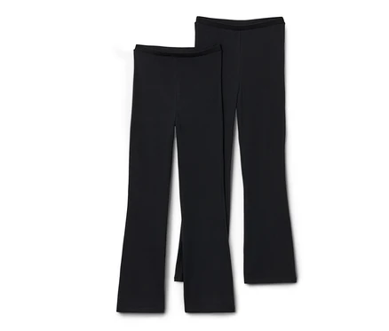 Két fekete, trapézszárú lány leggings.
