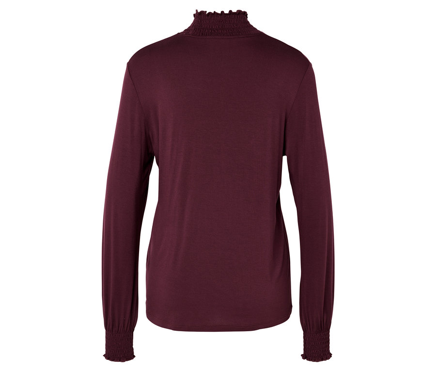 Bordó, hosszú ujjú felső fodros nyakrésszel.