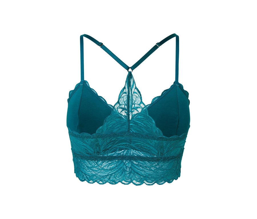 Közelkép egy türkiz csipkés bustier melltartóról.
