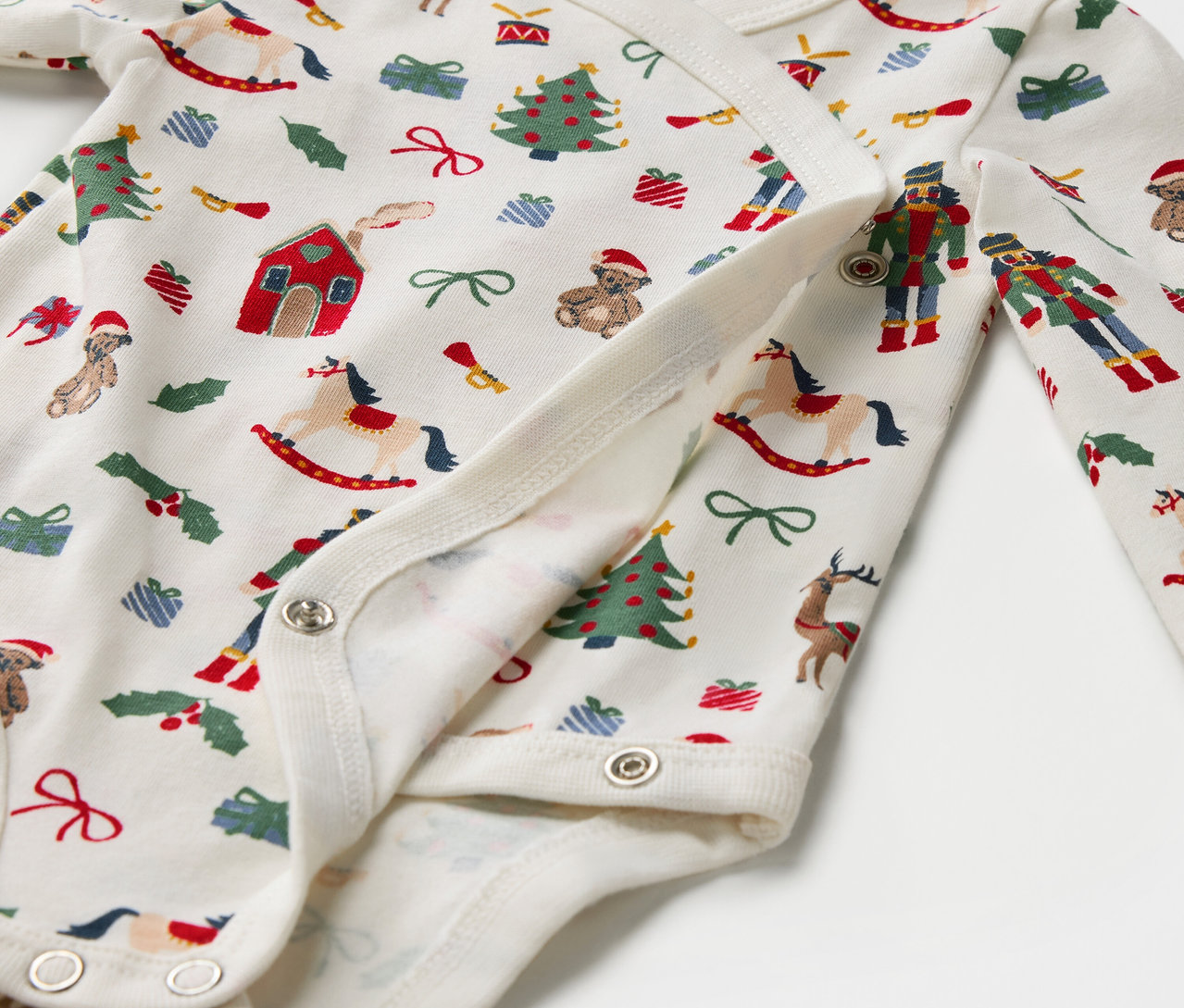 Pamut bodyrészlet karácsonyi mintával, patentos záródással.