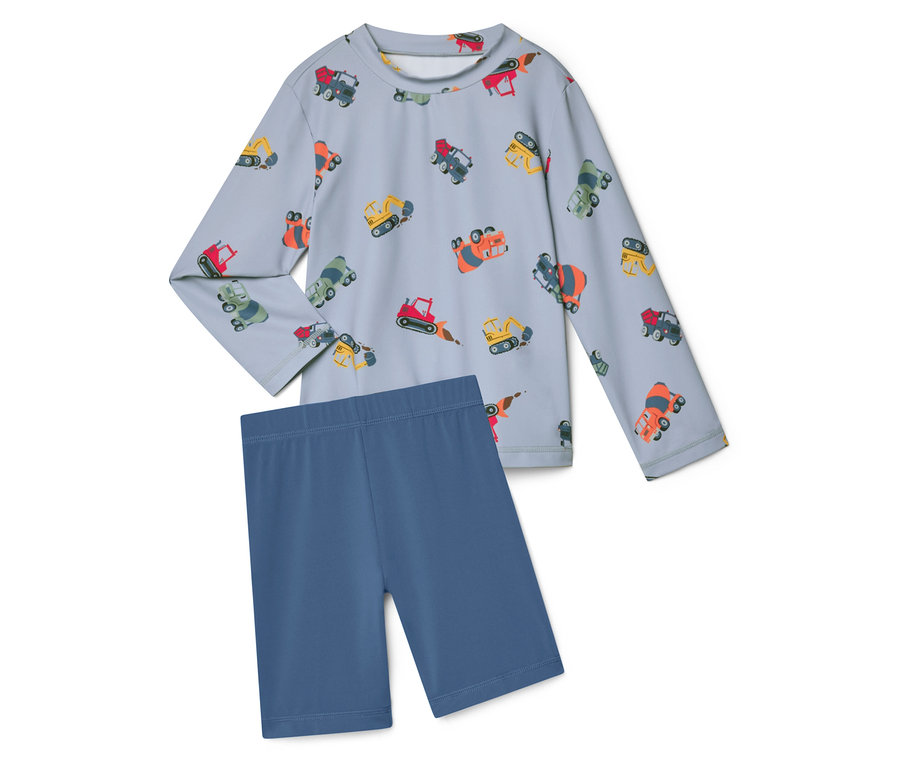 Világoskék, hosszú ujjú felső kotrógép mintával és hozzáillő rövid, kék leggings.