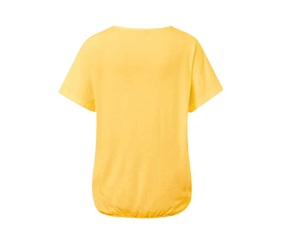 Sárga, hímzett rövid ujjú pólóblúz.