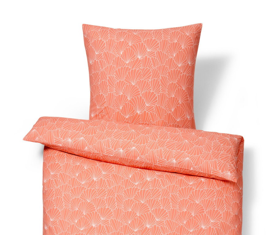 Narancssárga, normál méretű, fehér virágmintás renforcé ágynemű, párnával.