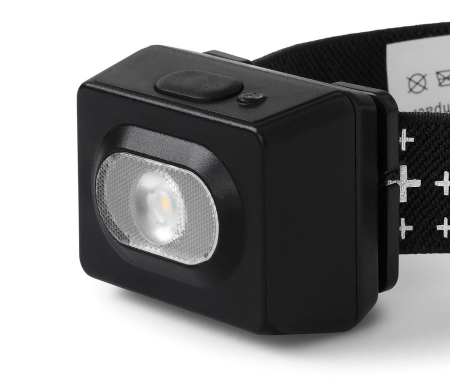 Egy fekete fejlámpa részletes képe.