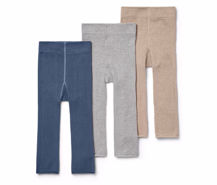 Három gyerek leggings kék, szürke és bézs színben egymás mellett.
