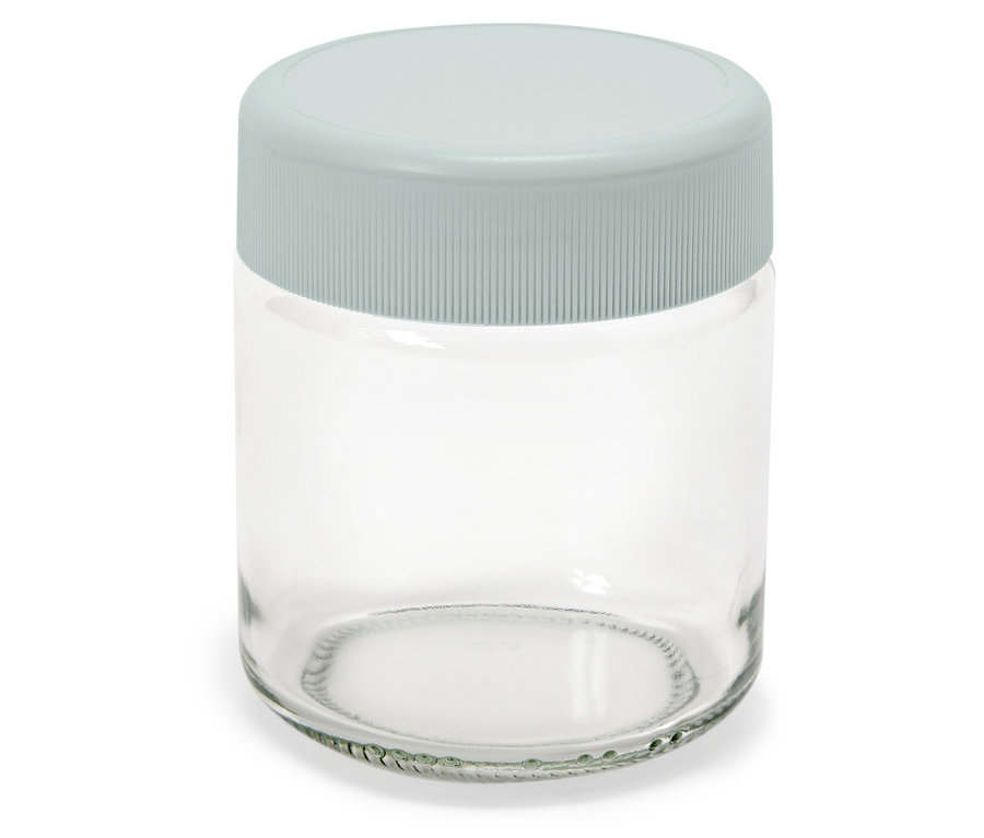 Üres üvegtartály szürke fedővel.