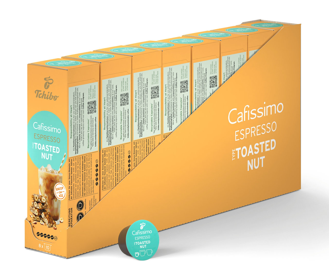 Egy sor Cafissimo Flavoured Espresso - Tostaed Nut kapszulacsomag egy sárga tartóban, plusz egyetlen kapszula.