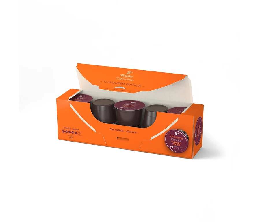 Egy nyitott narancssárga doboz tíz sötétlila Cafissimo Flavoured Espresso - Pumpkin Spiced kapszulával, két sorban elrendezve.