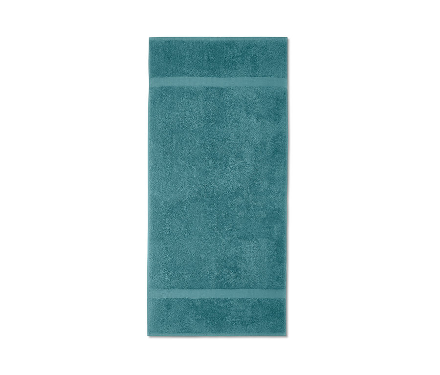 Egy kék színű 2 törölköző szettben részletfotója.