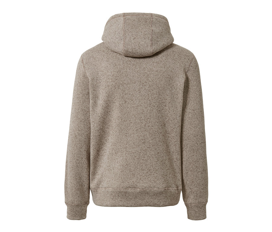 Egy bézs színű, kötött polárpulóver hátulnézete.