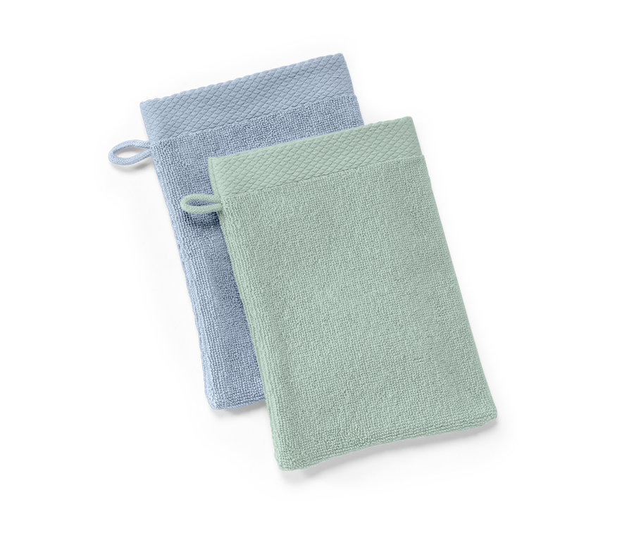 Két kozmetikai kesztyű, világoskék és világoszöld.