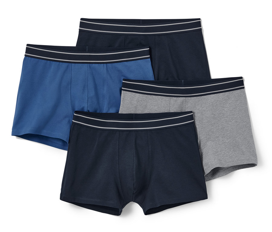 Négy férfi boxeralsó: kék, szürke és két sötétkék.