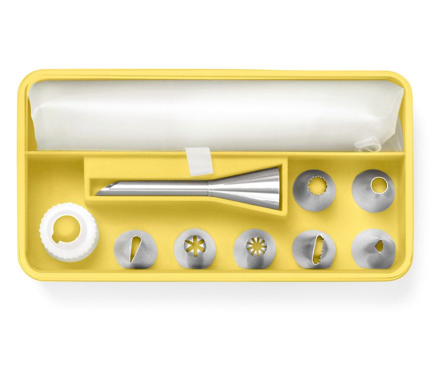 Sárga doboz habzsákokkal, adapterrel és zacskóval.